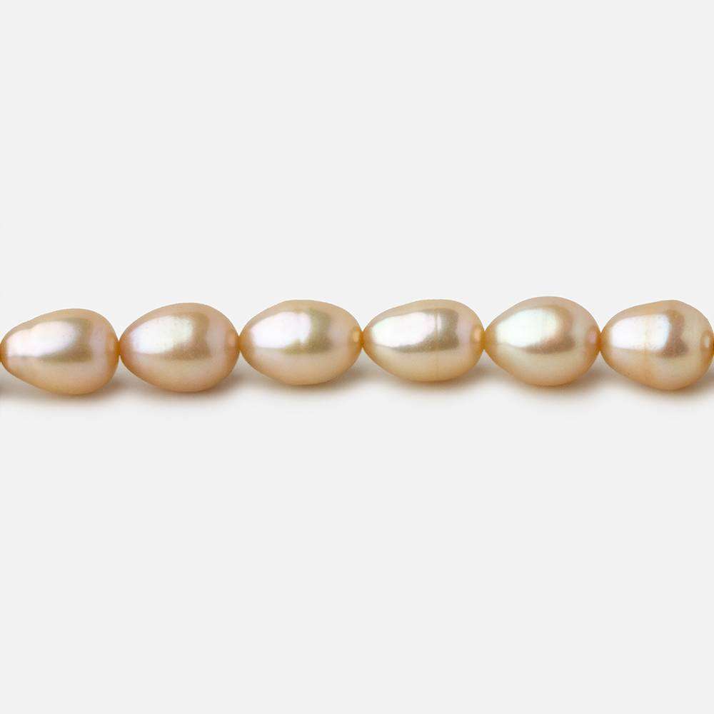 5.5x4.5-6.5x5mm Golden Beige straight drilled Oval freshwater pearls 16 inch 64 pieces A (ONLINE ORDER ONLY)