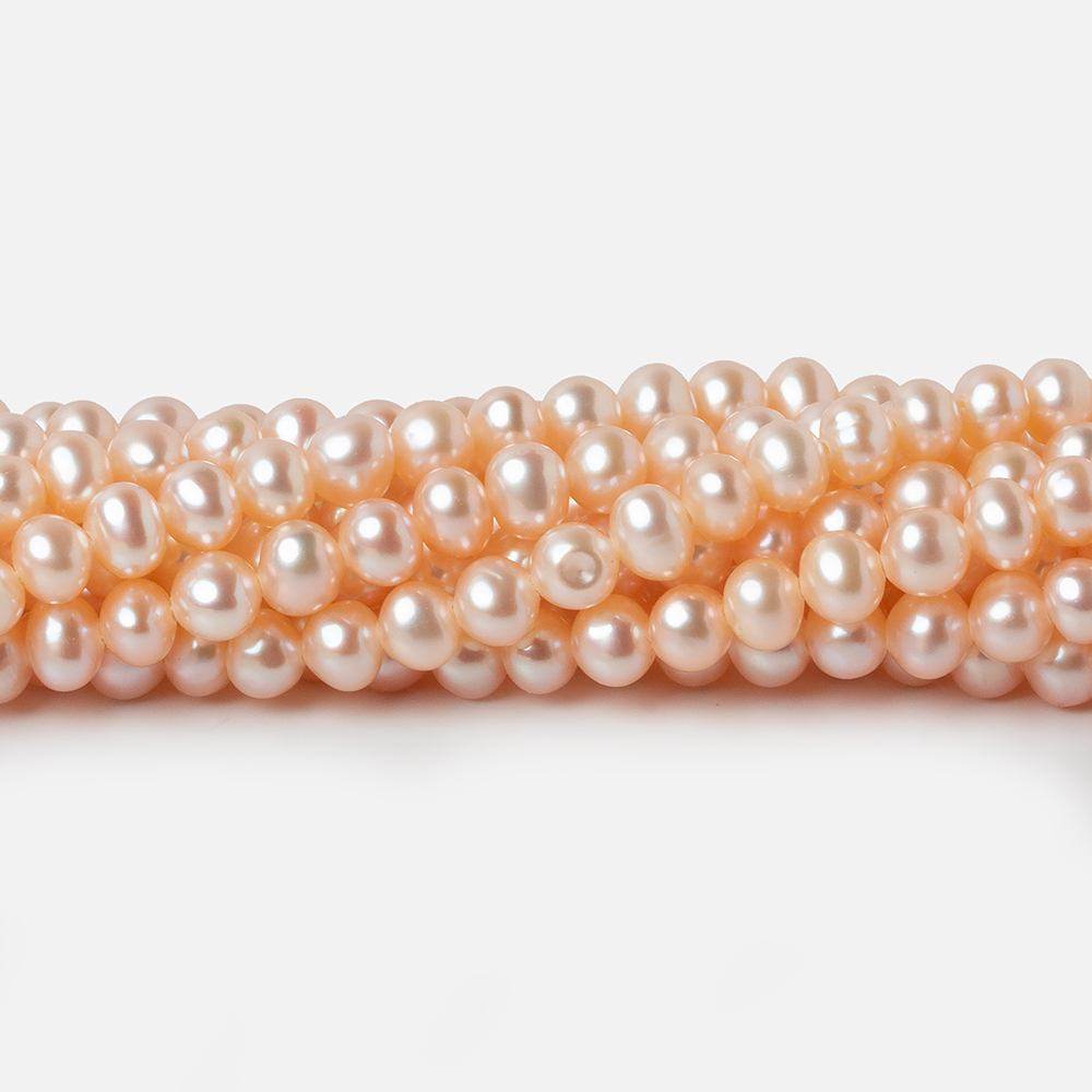 4.5x4mm Peach Side Drilled Off Round Freshwater Pearls 15 inch 98 pieces (ONLINE ORDER ONLY)