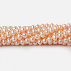 4.5x4mm Peach Side Drilled Off Round Freshwater Pearls 15 inch 98 pieces (ONLINE ORDER ONLY)