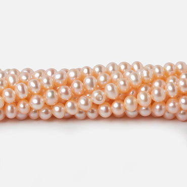 4.5x4mm Peach Side Drilled Off Round Freshwater Pearls 15 inch 98 pieces (ONLINE ORDER ONLY)