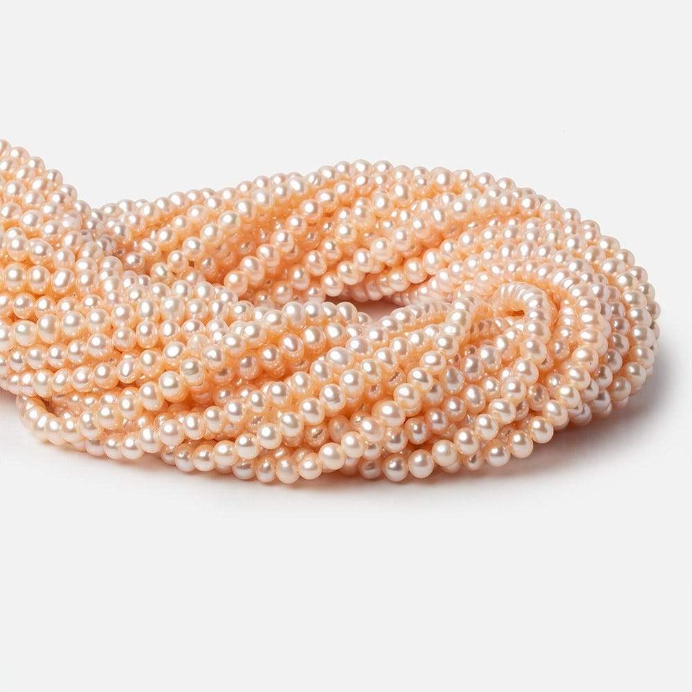 4.5x4mm Peach Side Drilled Off Round Freshwater Pearls 15 inch 98 pieces (ONLINE ORDER ONLY)
