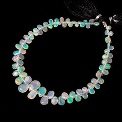 4x3-7x5mm Ethiopian Opal Plain Pears 8 inch 75 beads (ONLINE ORDER ONLY)