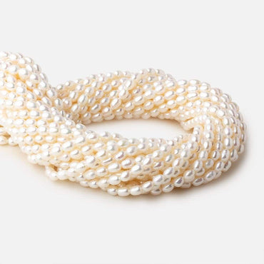 4x5-4.5x6mm Off White straight drilled Oval freshwater pearls 15.5 inch 68 pieces A (ONLINE ORDER ONLY)