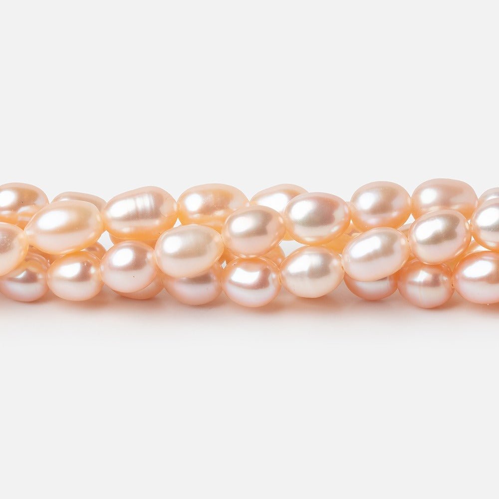 5-5.5mm Peach Petite Oval Freshwater Pearls 15.75 inch 75 Beads (ONLINE ORDER ONLY)