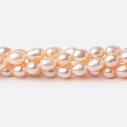 5-5.5mm Peach Petite Oval Freshwater Pearls 15.75 inch 75 Beads (ONLINE ORDER ONLY)