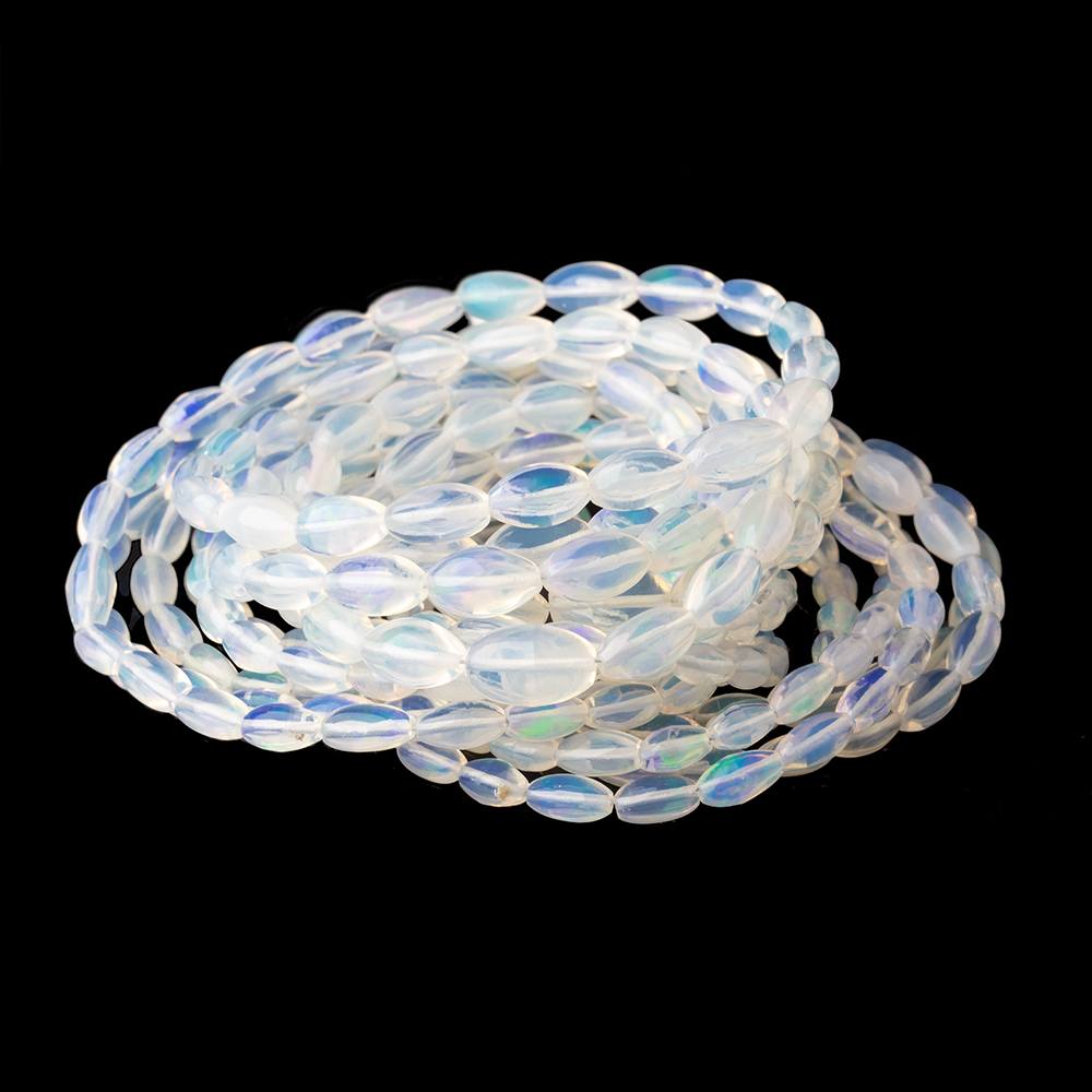 5.5-9.5mm Ethiopian Opal Plain Rice Beads 18 inch 62 pieces AA (ONLINE ORDER ONLY)