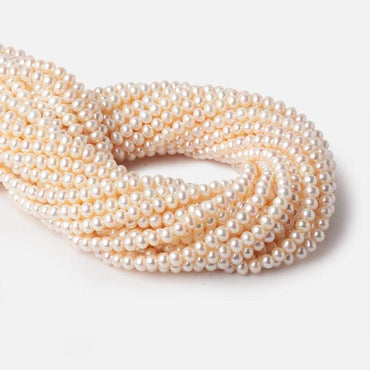 5.5x4mm Cream Side Drilled Off Round Freshwater Pearls 15 inch 85 pieces (ONLINE ORDER ONLY)