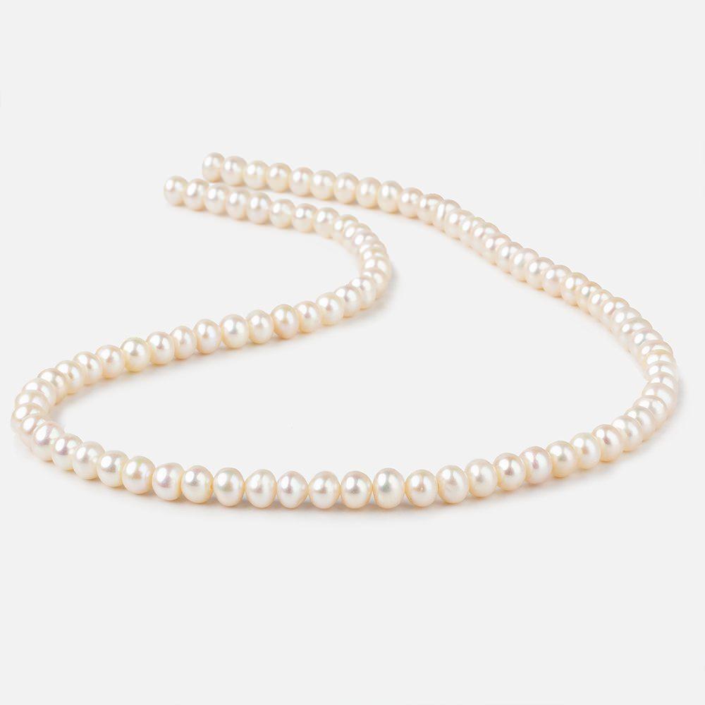 5.5x4mm Cream Side Drilled Off Round Freshwater Pearls 15 inch 85 pieces (ONLINE ORDER ONLY)