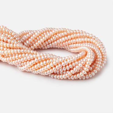 5.5mm Peach Button Freshwater Pearl Beads 15.5 inch 106 pieces (ONLINE ORDER ONLY)