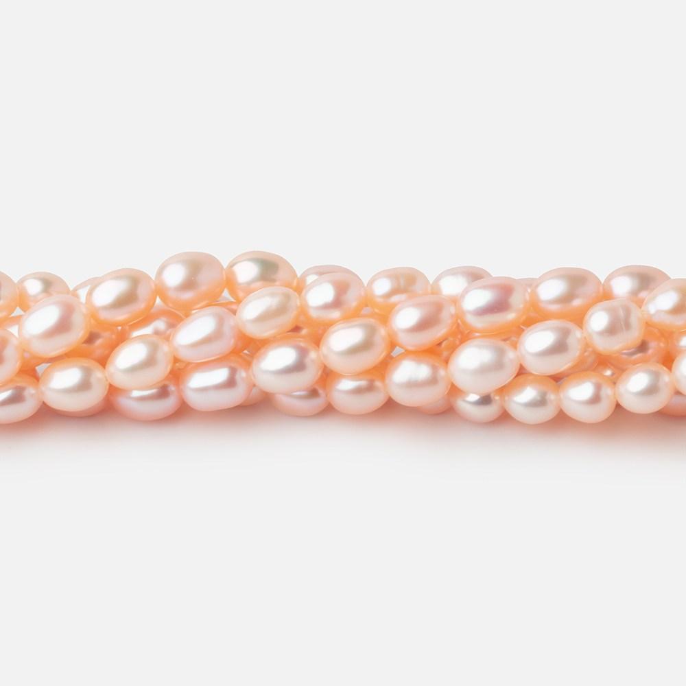 5.5x4mm Peach Straight Drill Oval Freshwater Pearl beads 15 inch 66 pieces (ONLINE ORDER ONLY)