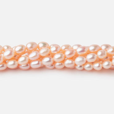 5.5x4mm Peach Straight Drill Oval Freshwater Pearl beads 15 inch 66 pieces (ONLINE ORDER ONLY)
