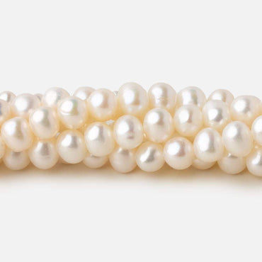 5-5.5mm Off White side drilled Off Round freshwater pearls 15 inch 78 pieces A (ONLINE ORDER ONLY)