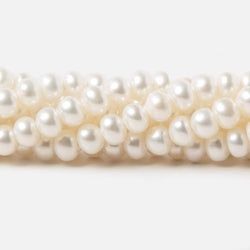 5mm Off White Center Drilled Button Freshwater Pearls 15.5 inch 100 pieces (ONLINE ORDER ONLY)