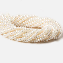 5mm Off White Center Drilled Button Freshwater Pearls 15.5 inch 100 pieces (ONLINE ORDER ONLY)