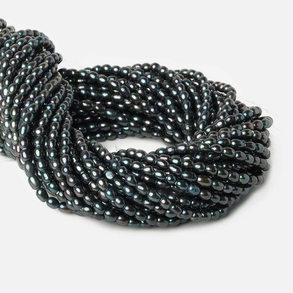 6x4mm Blue Peacock Large Hole Oval Freshwater Pearls 15inch 64 pcs (ONLINE ORDER ONLY)