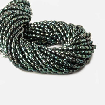 7x4mm Forest Green Peacock Large Hole Oval Freshwater Pearls 15inch 60pcs (ONLINE ORDER ONLY)