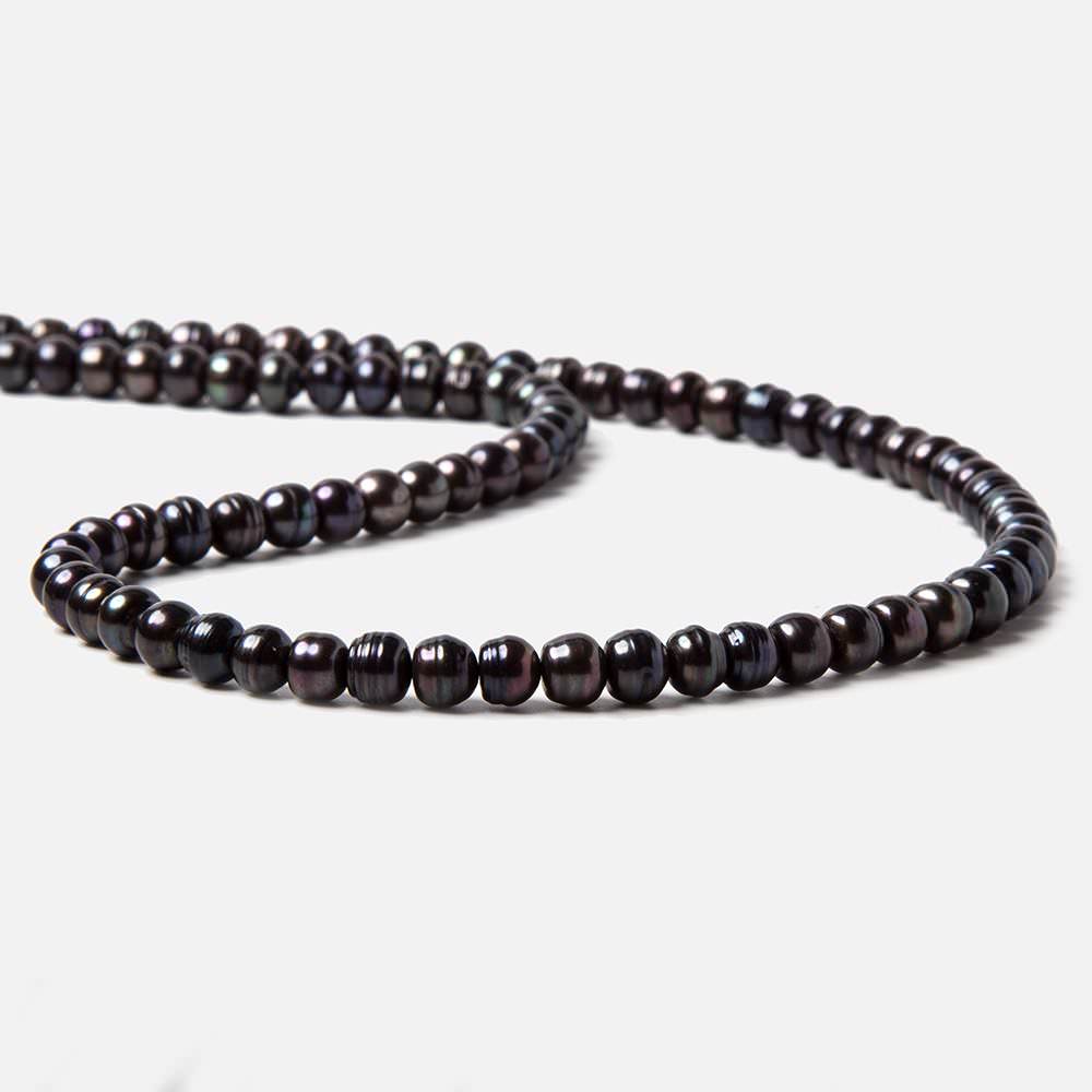 5x5.5-6x4.5mm Dark Peacock Black Button Freshwater Pearls 15.5 inch 95 pieces (ONLINE ORDER ONLY)