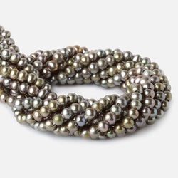6-7mm Irish Greens Large Hole Off Round Pearl 2.5mm drill hole, 15 inch, 75 pieces (ONLINE ORDER ONLY)