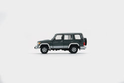BM Creations Toyota Land Cruiser LC76 Dark Red / Dark Grey - RHD 1:64 (ONLINE ORDER ONLY)