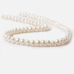 6.5x5-7x5.5mm Cream Side Drilled Oval Freshwater Pearls 16 inch 74 pieces (ONLINE ORDER ONLY)