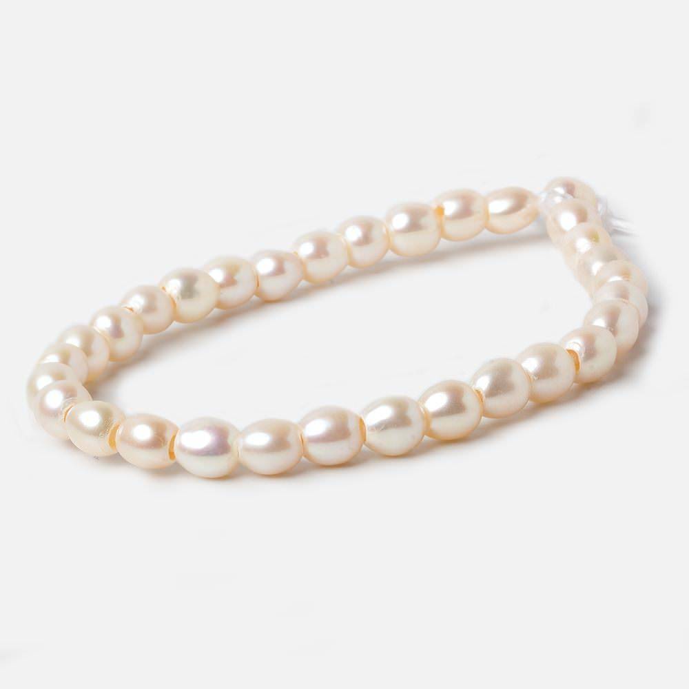 6.5x6.5mm Creamy White Straight Drilled Oval Large Hole pearls 8 inch 30 pieces AA (ONLINE ORDER ONLY)