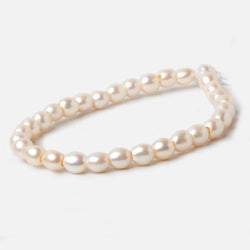6.5x6.5mm Creamy White Straight Drilled Oval Large Hole pearls 8 inch 30 pieces AA (ONLINE ORDER ONLY)