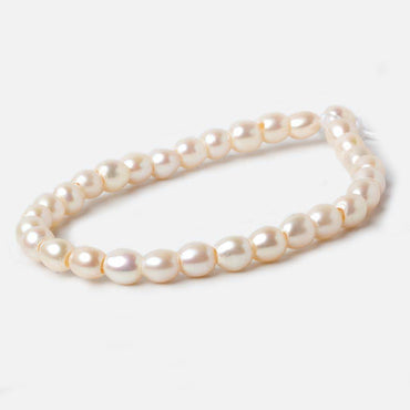 6.5x6.5mm Creamy White Straight Drilled Oval Large Hole pearls 8 inch 30 pieces AA (ONLINE ORDER ONLY)