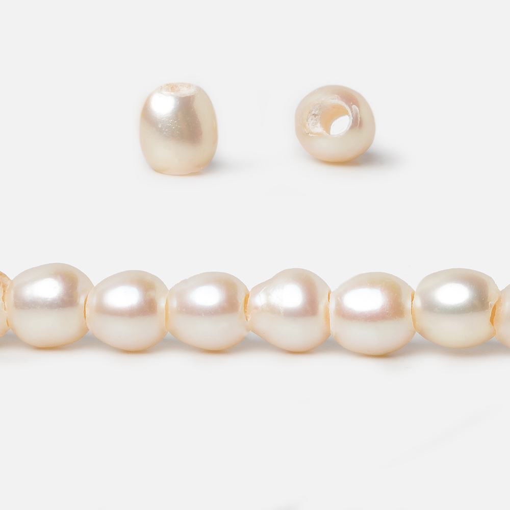 6.5x6.5mm Creamy White Straight Drilled Oval Large Hole pearls 8 inch 30 pieces AA (ONLINE ORDER ONLY)
