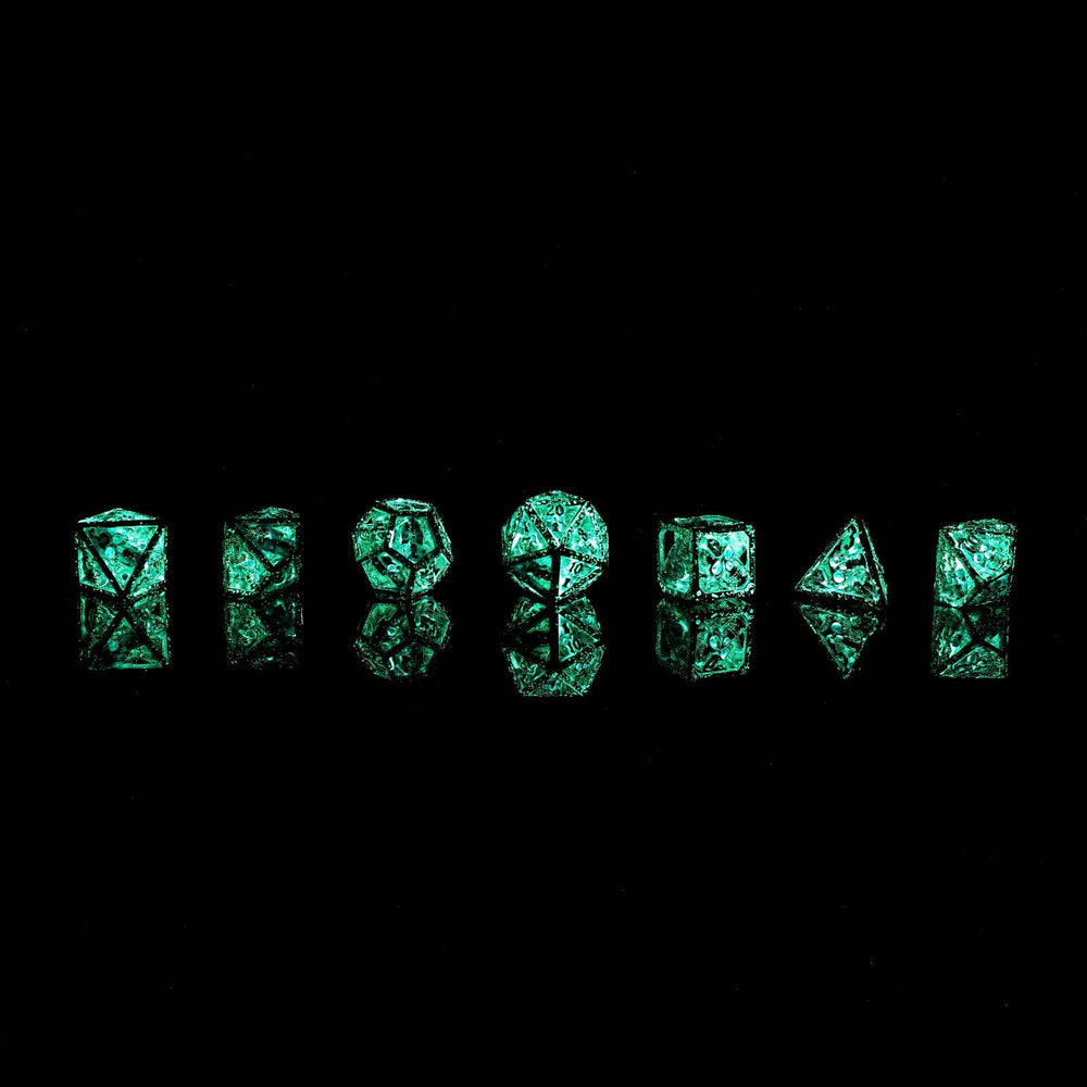 Skull's Grin Hollow Metal Dice Set - Glow in the Dark Blue (ONLINE ORDER ONLY)