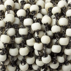 6mm White Ox Bone rounds Black Gold plated Cap and Chain by the foot 21 pcs (ONLINE ORDER ONLY)