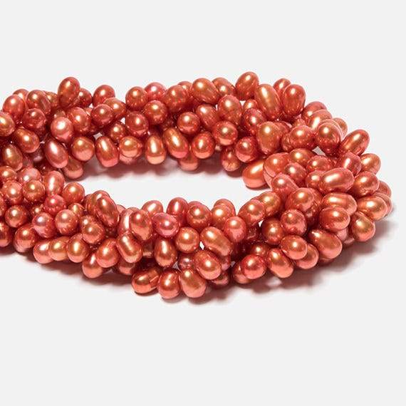 6x4mm Orange Top Drilled Oval Freshwater Pearls 16 inch 78 pcs (ONLINE ORDER ONLY)
