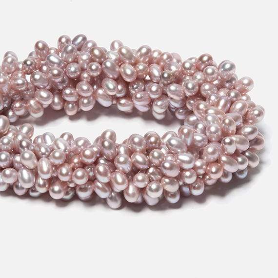 6x5-7x5mm Ice Pink Top Drilled Oval Freshwater Pearls 16 inch 96 pieces (ONLINE ORDER ONLY)