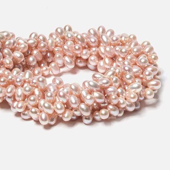 5x7mm Pink Top Drilled Oval Freshwater Pearls 16 inch 77 pieces (ONLINE ORDER ONLY)