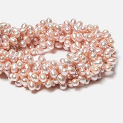 5x7mm Pink Top Drilled Oval Freshwater Pearls 16 inch 77 pieces (ONLINE ORDER ONLY)