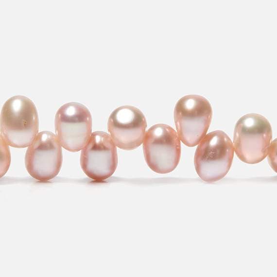 5x7mm Pink Top Drilled Oval Freshwater Pearls 16 inch 77 pieces (ONLINE ORDER ONLY)