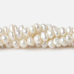 6-7mm White Center Drilled Keshi Freshwater Pearl 15.5 inch 85 pieces (ONLINE ORDER ONLY)
