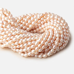 6x7mm White straight drilled Oval freshwater pearls 15 inch 52 pieces A (ONLINE ORDER ONLY)