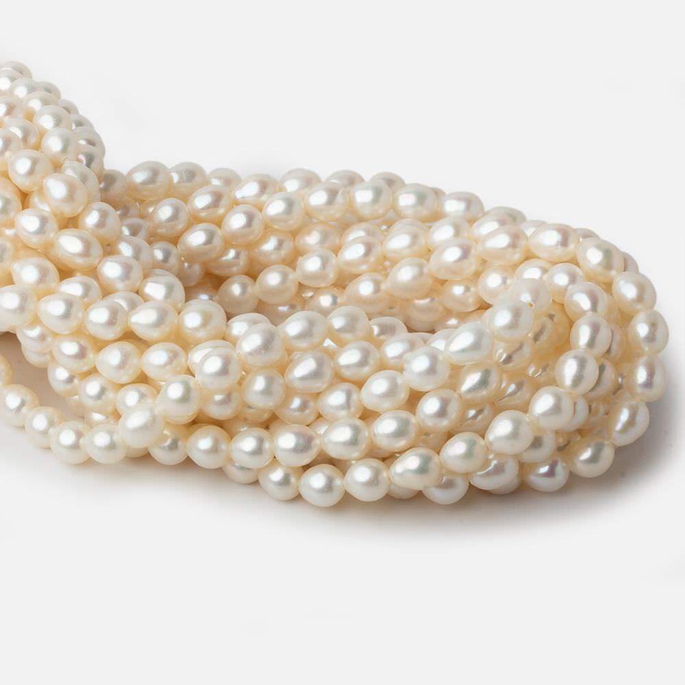 6x7mm Cream Straight Drill Oval Freshwater Pearls 15 inch 52 pieces A (ONLINE ORDER ONLY)