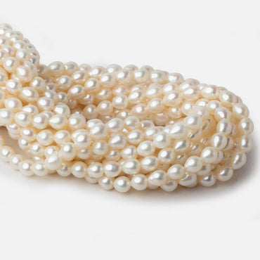 6x7mm Cream Straight Drill Oval Freshwater Pearls 15 inch 52 pieces A (ONLINE ORDER ONLY)