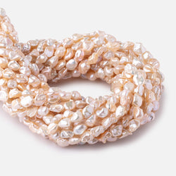 7-9mm Peach Straight Drilled Keshi Freshwater Pearls 16 inch 54 pieces (ONLINE ORDER ONLY)