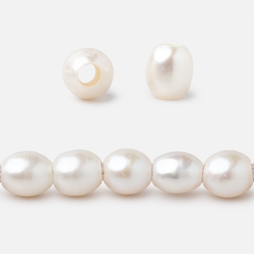 7x6-8x7mm Off White Oval 2.5mm Drill Hole Freshwater Pearls 53 pieces (ONLINE ORDER ONLY)