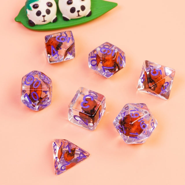 Orange Skull Dice | Clear RPG 7-Dice Set w/ Purple Numbers (Online Only)