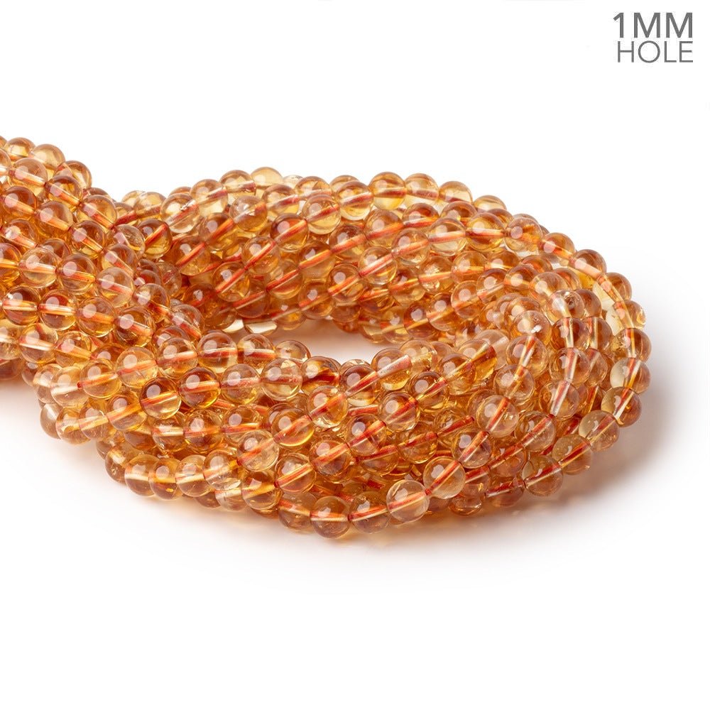 7mm Citrine Plain Rounds 15 inch 58 Beads with 1mm Drill Holes AA (ONLINE ORDER ONLY)