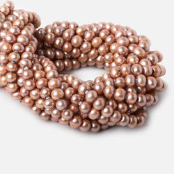 7mm Salmon Large Hole Off Round Freshwater Pearls 15 inches 65 pieces (ONLINE ORDER ONLY)