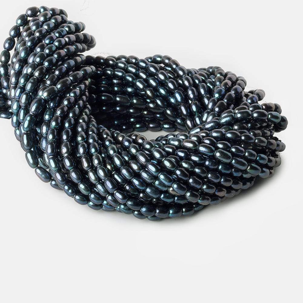 7x5mm-8x5mm Indigo Deep Blue Base Large Hole Oval Freshwater Pearls 15inch 48pcs (ONLINE ORDER ONLY)