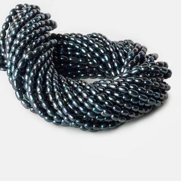 7x5mm-8x5mm Indigo Deep Blue Base Large Hole Oval Freshwater Pearls 15inch 48pcs (ONLINE ORDER ONLY)