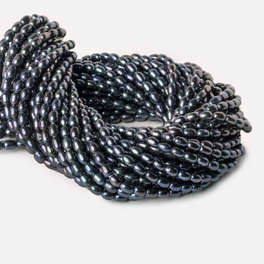 7x5mm Indigo Blue Large Hole Oval Freshwater Pearls 15inch 48pcs (ONLINE ORDER ONLY)