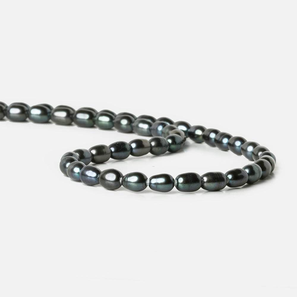 7x5Platinum Peacock Large Hole Oval Freshwater Pearls 15 inch 48 pcs (ONLINE ORDER ONLY)
