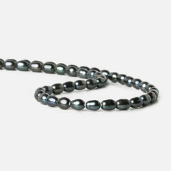 7x5Platinum Peacock Large Hole Oval Freshwater Pearls 15 inch 48 pcs (ONLINE ORDER ONLY)