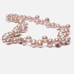 7x5-8x6mm Peachy Pink Top Drilled Oval Freshwater Pearls 16 inch 74 pieces (ONLINE ORDER ONLY)